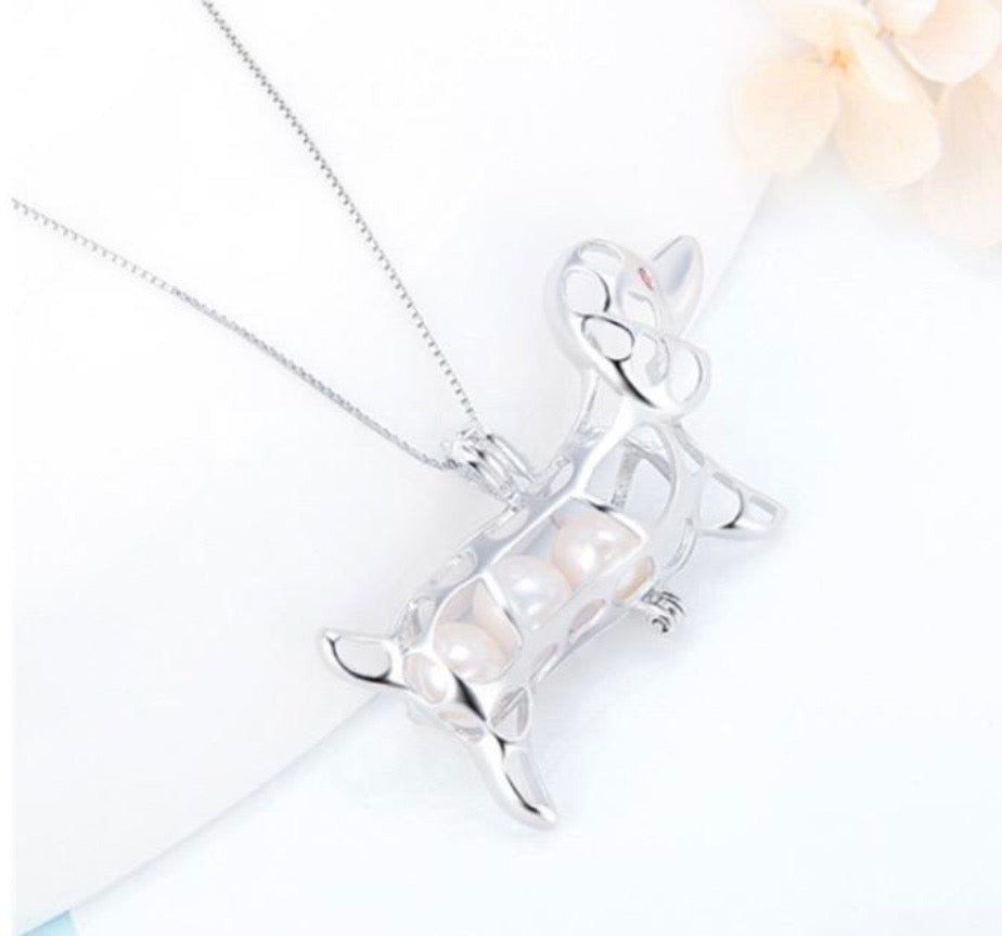 SSC 24 - The Sausage Dog Pearl cage pendant