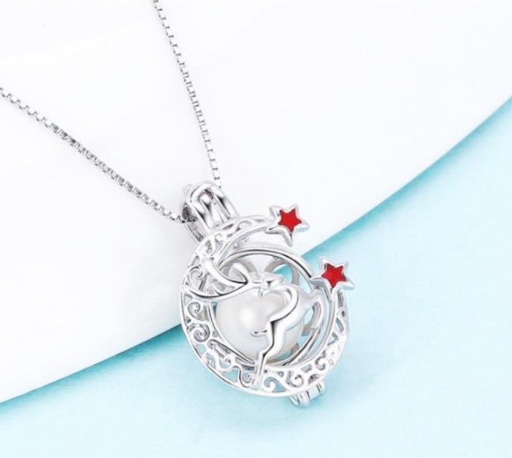 CH 10 - Leaping Reindeer Pearl cage pendant