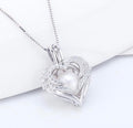 SSC 28 - Sparkle Angel Wings Pearl cage pendant
