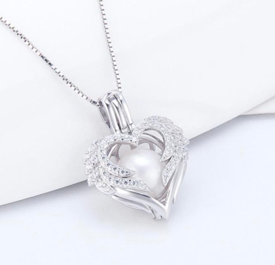SSC 28 - Sparkle Angel Wings Pearl cage pendant